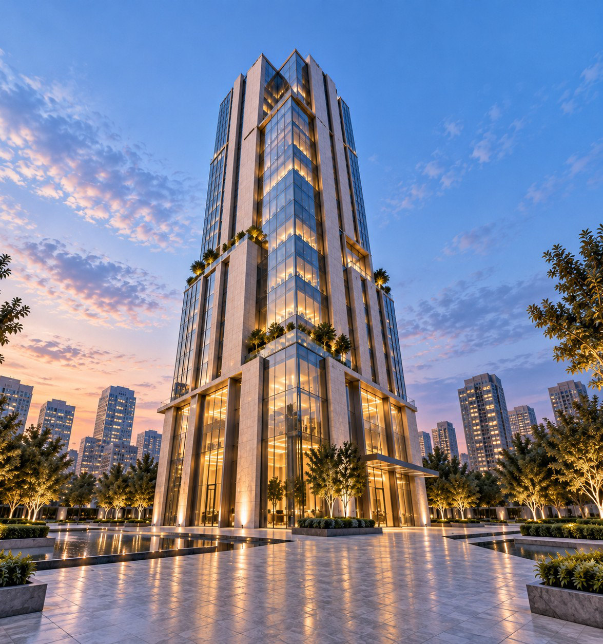 Glass office tower above a reflecting pool at sunset
